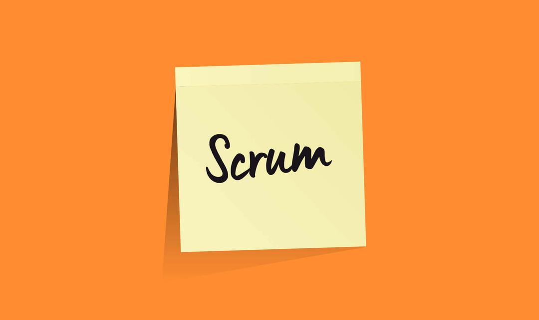 Een post-it met daarop het woord Scrum er op geschreven